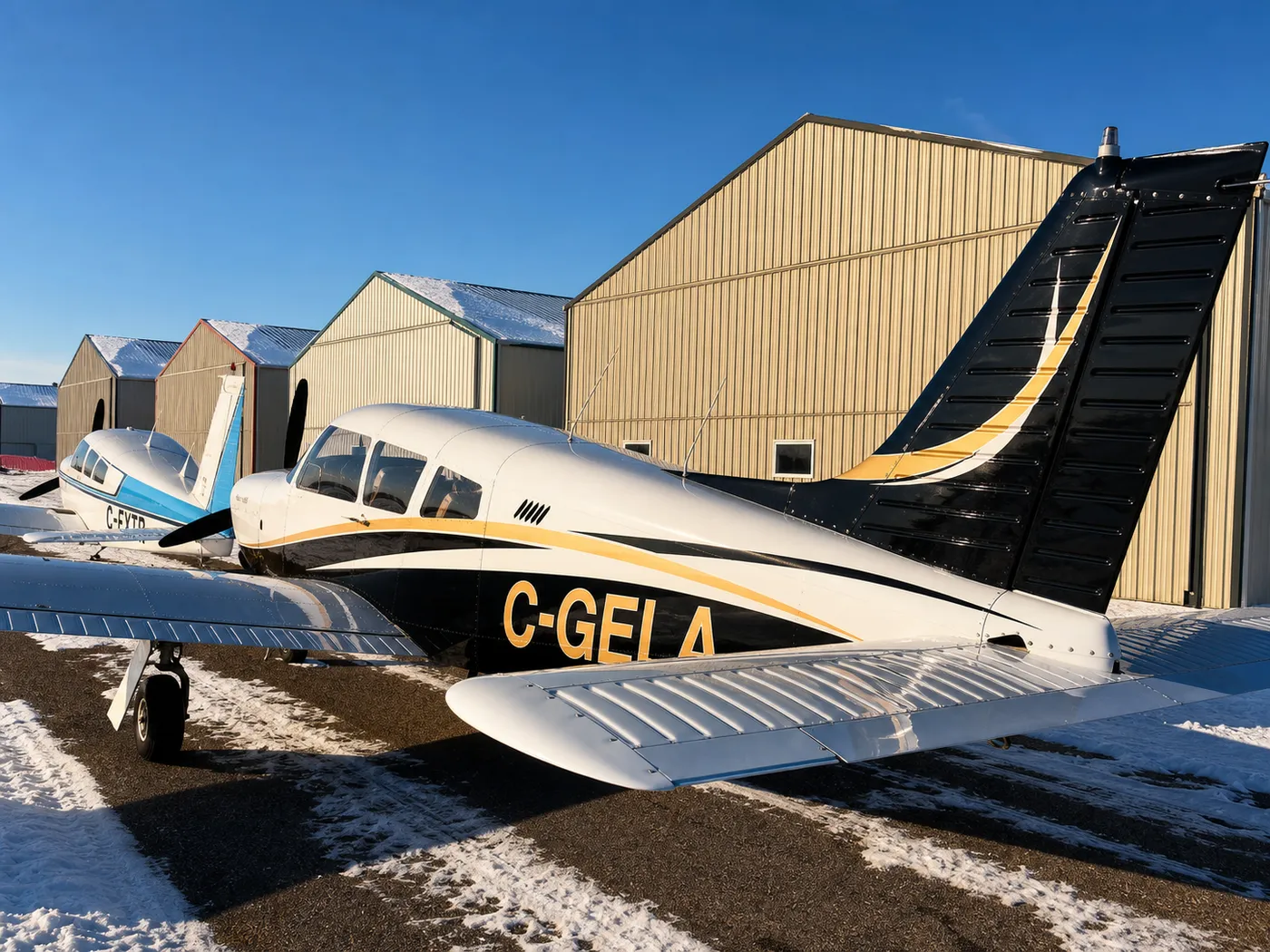 Black and gold single on snow ramp
